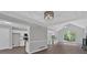 Open living room with hardwood floors, vaulted ceiling and kitchen view at 4050 Harvest Ridge Dr, Douglasville, GA 30135