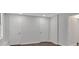 Basement with two closets and dark brown flooring at 4050 Harvest Ridge Dr, Douglasville, GA 30135