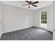 Bright bedroom with ceiling fan and grey carpet at 4050 Harvest Ridge Dr, Douglasville, GA 30135