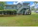 Exterior view of the house with landscaping and yard at 4050 Harvest Ridge Dr, Douglasville, GA 30135