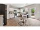 Modern kitchen with stainless steel appliances and access to backyard at 415 Splash Pointe, Temple, GA 30179
