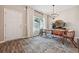 Modern dining area with wood table and stylish rug at 415 Splash Pointe, Temple, GA 30179