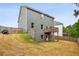 Gray two story house with large deck and fenced backyard at 415 Splash Pointe, Temple, GA 30179