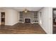 Living room with fireplace and built-in shelving at 801 River Mill Cir, Roswell, GA 30075