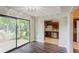 Dining area with sliding glass doors to patio and kitchen access at 801 River Mill Cir, Roswell, GA 30075