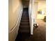 Carpeted staircase leading to the second floor at 119 Odyssey Turn, Conyers, GA 30012