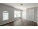 Bright bedroom with hardwood floors and a window at 2656 Staunton Ln, Duluth, GA 30096