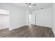 Bright bedroom with wood-look floors and ample closet space at 1985 Saint Johns Sw Pl, Atlanta, GA 30315