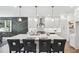 White kitchen with center island and gold accents at 1985 Saint Johns Sw Pl, Atlanta, GA 30315