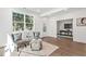 Spacious living area with hardwood floors, ample natural light and access to office at 1985 Saint Johns Sw Pl, Atlanta, GA 30315