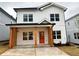 Two-story house with modern farmhouse exterior at 1985 Saint Johns Sw Pl, Atlanta, GA 30315