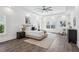 Spacious main bedroom with large windows and hardwood floors at 1985 Saint Johns Sw Pl, Atlanta, GA 30315