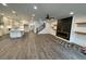 Open living space featuring a fireplace and built-in shelving at 1985 Saint Johns Sw Pl, Atlanta, GA 30315
