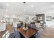 Open dining area with a large table and access to the kitchen at 1985 Saint Johns Sw Pl, Atlanta, GA 30315