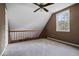 Upstairs bedroom with a view and ceiling fan at 6945 Butner Rd, Atlanta, GA 30349