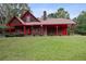 House exterior featuring a brown wooden facade with red accents at 6945 Butner Rd, Atlanta, GA 30349