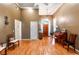 Spacious foyer with high ceilings, hardwood floors, and piano at 2170 S River Sw Rd, Conyers, GA 30094