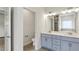 Modern bathroom with double vanity, light gray cabinets, and private toilet at 141 Lynn Top Rdg, Dallas, GA 30157