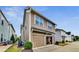 Rear view of two-car garage with extra storage space at 2172 Haventree Ct, Lawrenceville, GA 30043