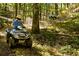 Explore scenic wooded trails on an ATV at 6000 Stallion Rdg, Douglasville, GA 30135