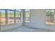 Sun-drenched living room with large windows and backyard view at 6000 Stallion Rdg, Douglasville, GA 30135
