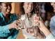 Friends enjoying drinks together in a lively atmosphere at 6000 Stallion Rdg, Douglasville, GA 30135