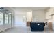 Open concept kitchen and living area with a view of the backyard at 6000 Stallion Rdg, Douglasville, GA 30135