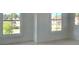 Well-lit bedroom with large windows and baseboards at 6000 Stallion Rdg, Douglasville, GA 30135