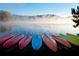 Colorful kayaks lined up by the lake, ready for a relaxing paddle at 6000 Stallion Rdg, Douglasville, GA 30135