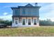 Two-story home with gray siding and white accents at 6000 Stallion Rdg, Douglasville, GA 30135