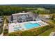 Aerial view of community pool, clubhouse, and lake at 6000 Stallion Rdg, Douglasville, GA 30135