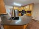 Modern kitchen with stainless steel appliances and dark countertops at 215 Moseley Crossing Dr, Stockbridge, GA 30281