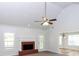 Spacious living room with fireplace and vaulted ceiling at 80 Stewart Hollow Ln, Covington, GA 30016