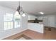 Bright dining area with kitchen access and view to backyard at 80 Stewart Hollow Ln, Covington, GA 30016