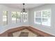 Breakfast nook with tile floor and bay window at 80 Stewart Hollow Ln, Covington, GA 30016