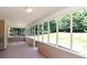 Relaxing screened porch overlooking a large backyard at 80 Stewart Hollow Ln, Covington, GA 30016