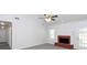 Living room featuring a fireplace and vaulted ceiling at 80 Stewart Hollow Ln, Covington, GA 30016