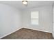 Simple bedroom with carpet flooring and neutral walls at 4652 Parkway Cir, Atlanta, GA 30349