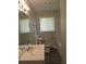 Bathroom with tub, toilet and sink at 2585 Westchester Dr, Atlanta, GA 30344
