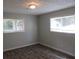 Spacious bedroom with two windows at 2585 Westchester Dr, Atlanta, GA 30344