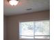 Well-lit bedroom with window and blinds at 2585 Westchester Dr, Atlanta, GA 30344