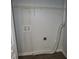 Laundry closet with hookups and shelving at 2585 Westchester Dr, Atlanta, GA 30344