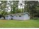 Side view of light blue house at 2585 Westchester Dr, Atlanta, GA 30344