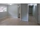 Open living area with tile floors and hallway access at 2585 Westchester Dr, Atlanta, GA 30344