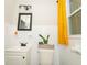 Simple bathroom with white tile and a small vanity at 2190 Gordon Se Cir, Smyrna, GA 30080