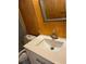 Modern bathroom vanity with white countertop and new faucet at 3600 Grady Smith Rd, Loganville, GA 30052