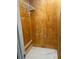 Shelved closet with wood paneling and tile flooring at 3600 Grady Smith Rd, Loganville, GA 30052