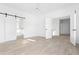 Spacious main bedroom with light wood floors and an ensuite bathroom at 6051 Stallion Rdg, Douglasville, GA 30135