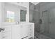 Modern bathroom with white vanity and grey tile shower at 6051 Stallion Rdg, Douglasville, GA 30135