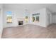 Spacious living room with hardwood floors and a fireplace at 6051 Stallion Rdg, Douglasville, GA 30135